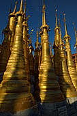 Inle Lake Myanmar. Indein, on the summit of a hill the  Shwe Inn Thein Paya a cluster of hundreds of ancient stupas. Many of them are ruined and overgrown with bushes. 